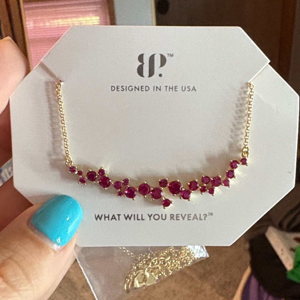 BP Gold Necklace with lab created ruby